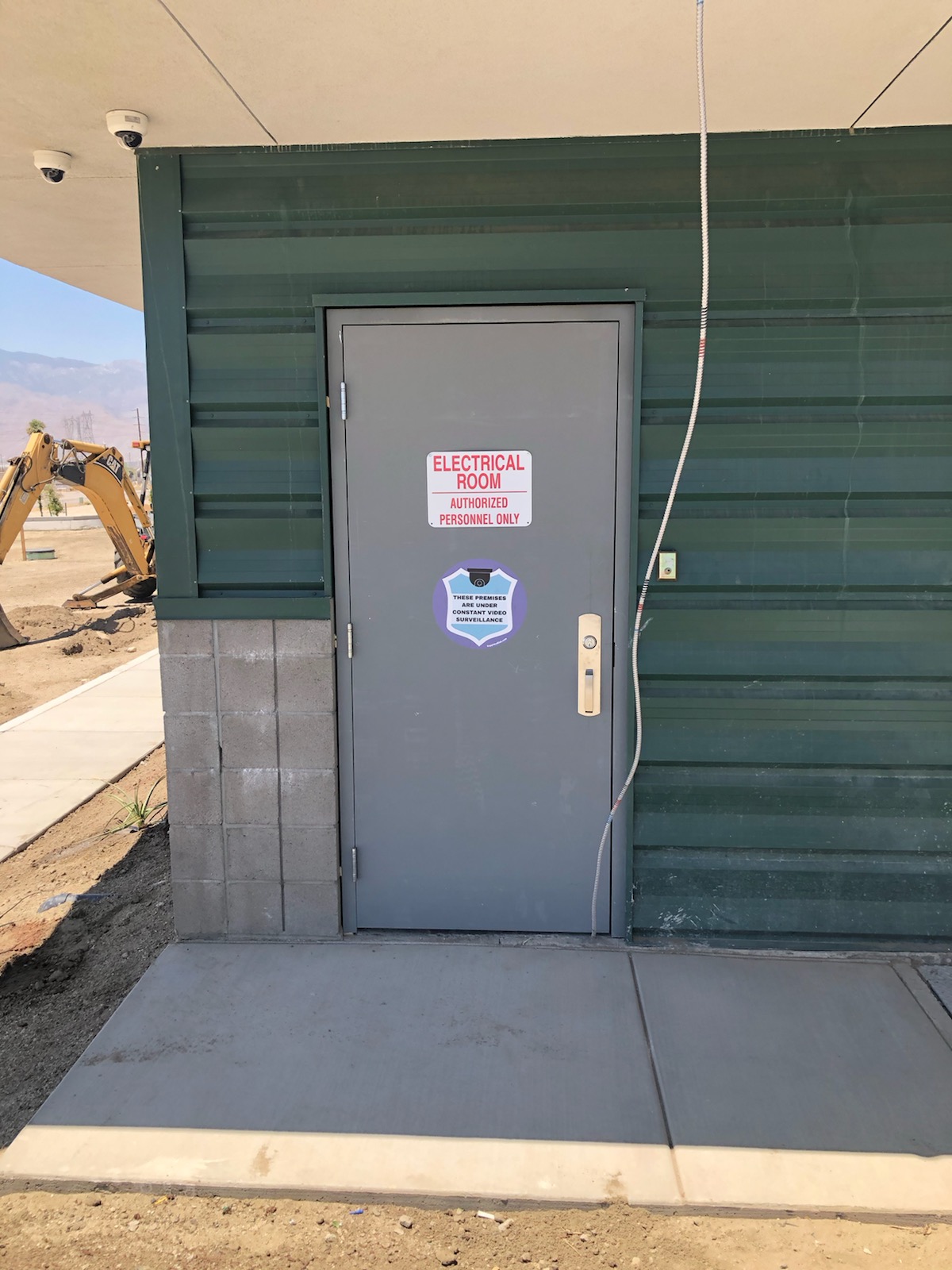 Customer door with sign